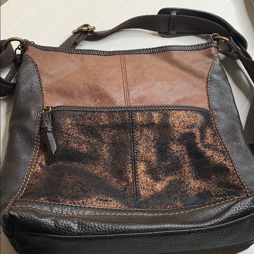 The Sak Brown Copper Leather Crossbody Bag. BRN1563A
